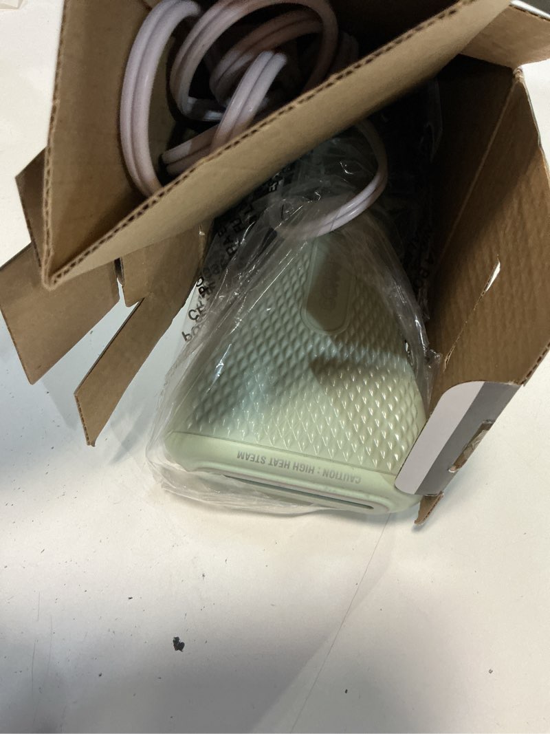 Condition photo showing As Is for conair handheld garment steamer for clothes - power steam: small size, big power - great for home, office, or travel with dual voltage for worldwide use, mint green mint green travel size