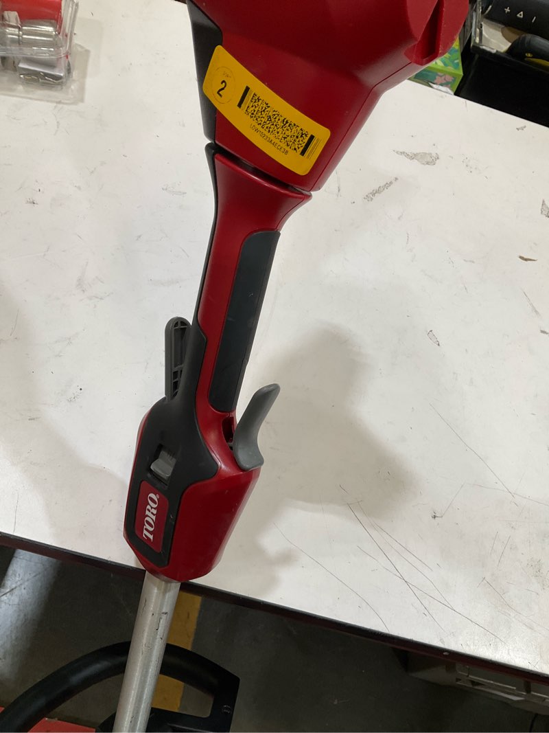 Condition photo showing As Is for toro 60v max flex-force brushless string trimmer