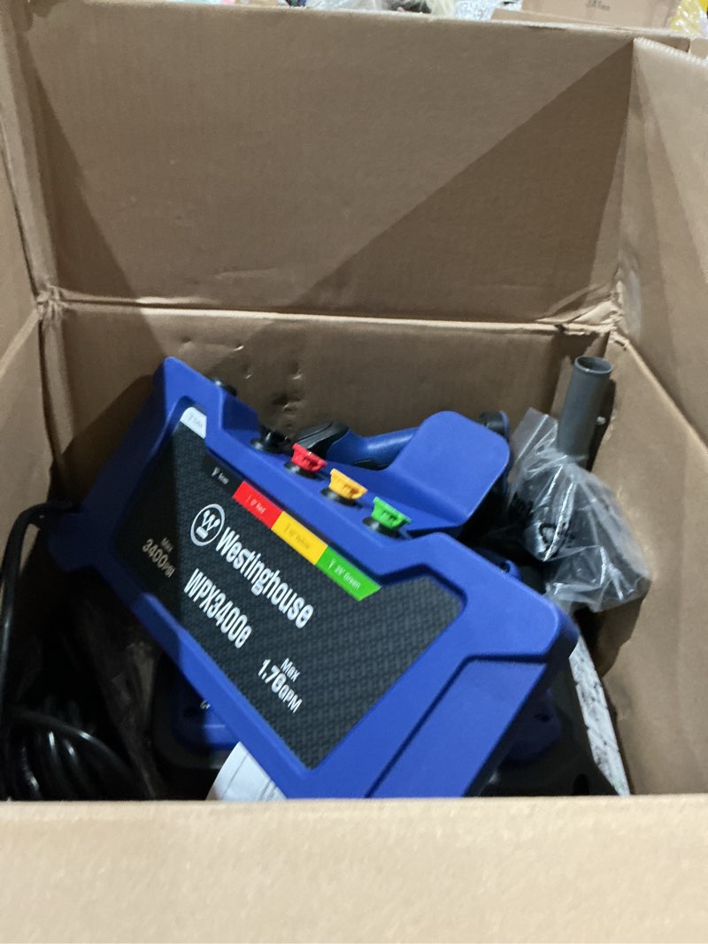 Condition photo showing As Is for westinghouse wpx3400e electric pressure washer, 3400 max psi and 2.0 max gpm, brushless motor, onboard soap tank, spray gun and wand, 5 nozzle set, for cars/fences/driveways/homes/patios/furniture