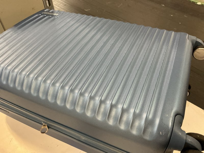 Condition photo showing As Is for american tourister stratum 3.0 medium 24-inch spinner, airline approved, durable hardside luggage, expands 1.5", rightheight™ adjustable handle, elemental blue