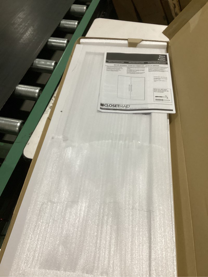 Condition photo showing Good Condition for  closetmaid brightwood white wood closet tower door 25-in x 30.12-in