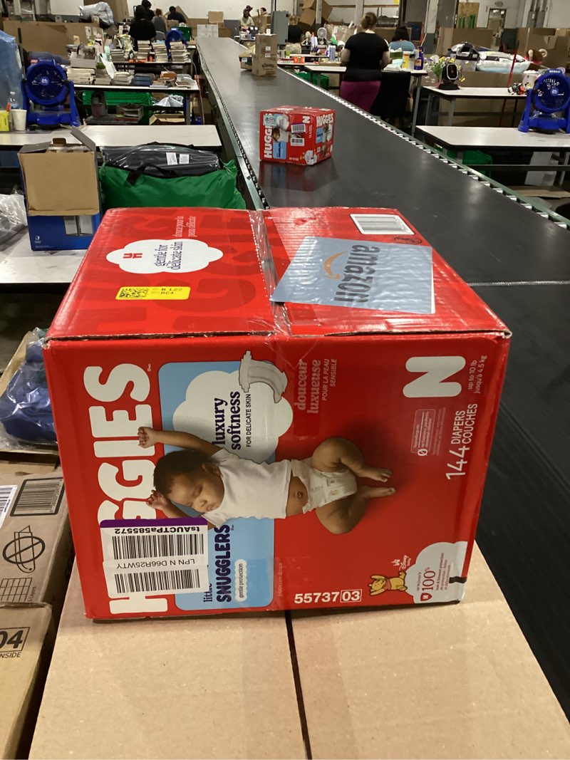 Condition photo showing Good Condition for huggies little snugglers newborn diapers, 144 count newborn 144