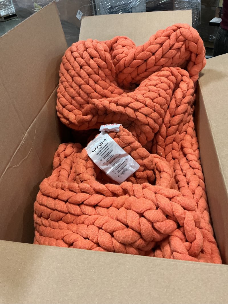 Condition photo showing Good Condition for YnM Chunky Throw Blanket, Medium-Weight, Hand Knitted, Skin Friendly, Ventilated and Breathable, Machine Washable, Home Décor Piece for Couch, Sofa and Bed (Exotic Orange, 50x70 Inch)