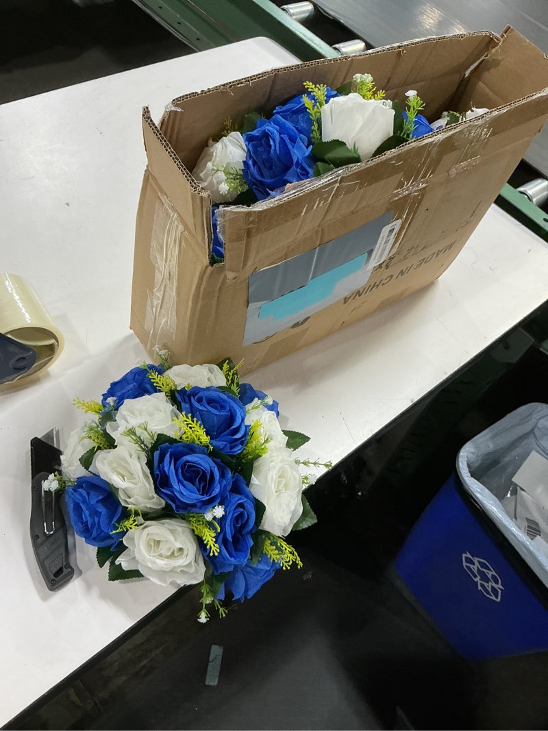 Condition photo showing New/Like New for blue and white fake flowers 