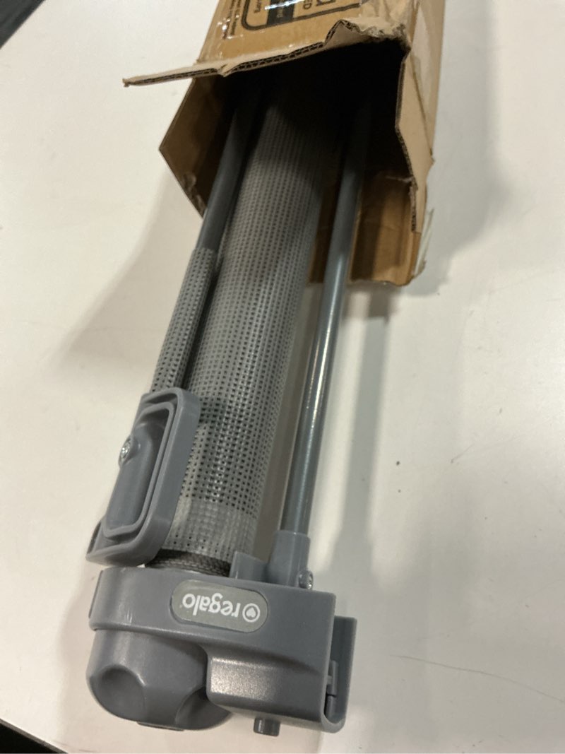 Condition photo showing As Is for Regalo Extra Wide Retractable Baby Gate, Award Winning Brand, Expands up to 50" Wide, Easy Install, Includes Installation Template, Locking Indicator