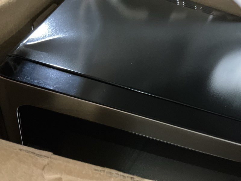 Condition photo showing Good Condition for Farberware 1.2 Cu. Ft. Countertop Microwave Oven – 1000 Watts Power, Smart Sensor Auto Cook Settings, Defrost, Easy Clean and Child Safety Lock - Stainless 1.2 Cu.Ft Stainless Steel