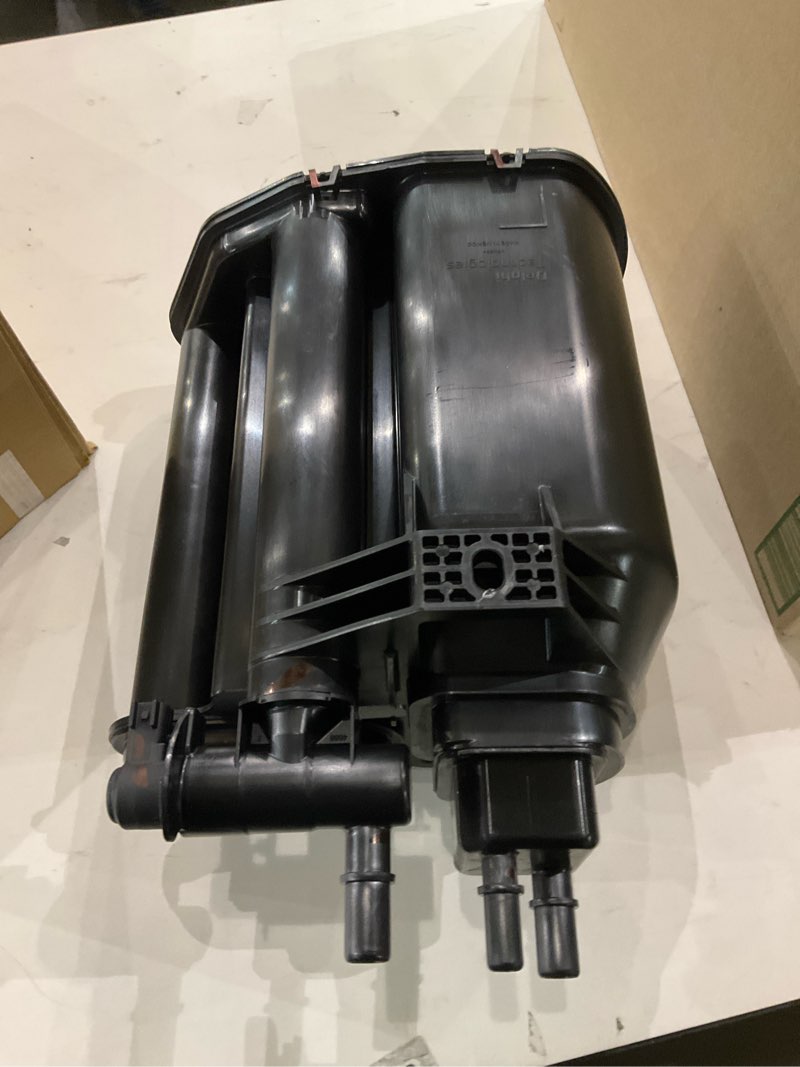 Condition photo showing As Is for vehicle's vapor canister