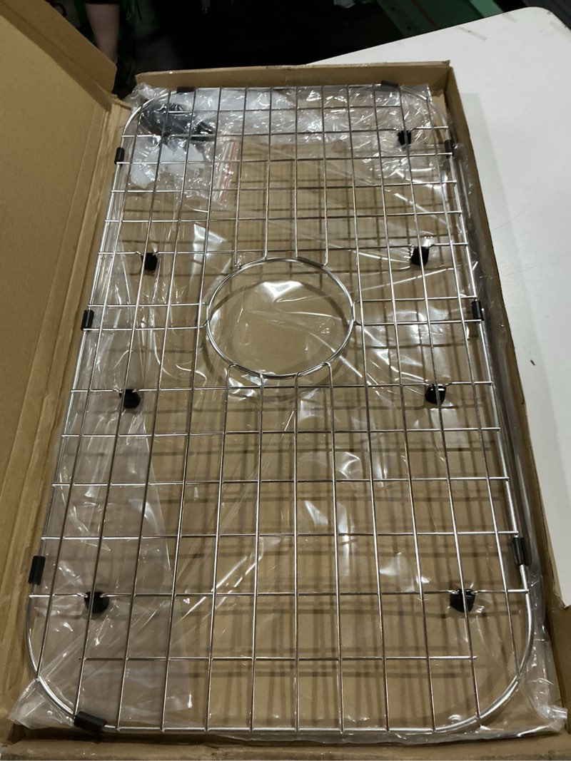 Condition photo showing Good Condition for serene valley sink protector grid 26-1/16" x 14-1/16", centered drain with corner radius 3-1/2", 304 stainless steel material nlw2614c