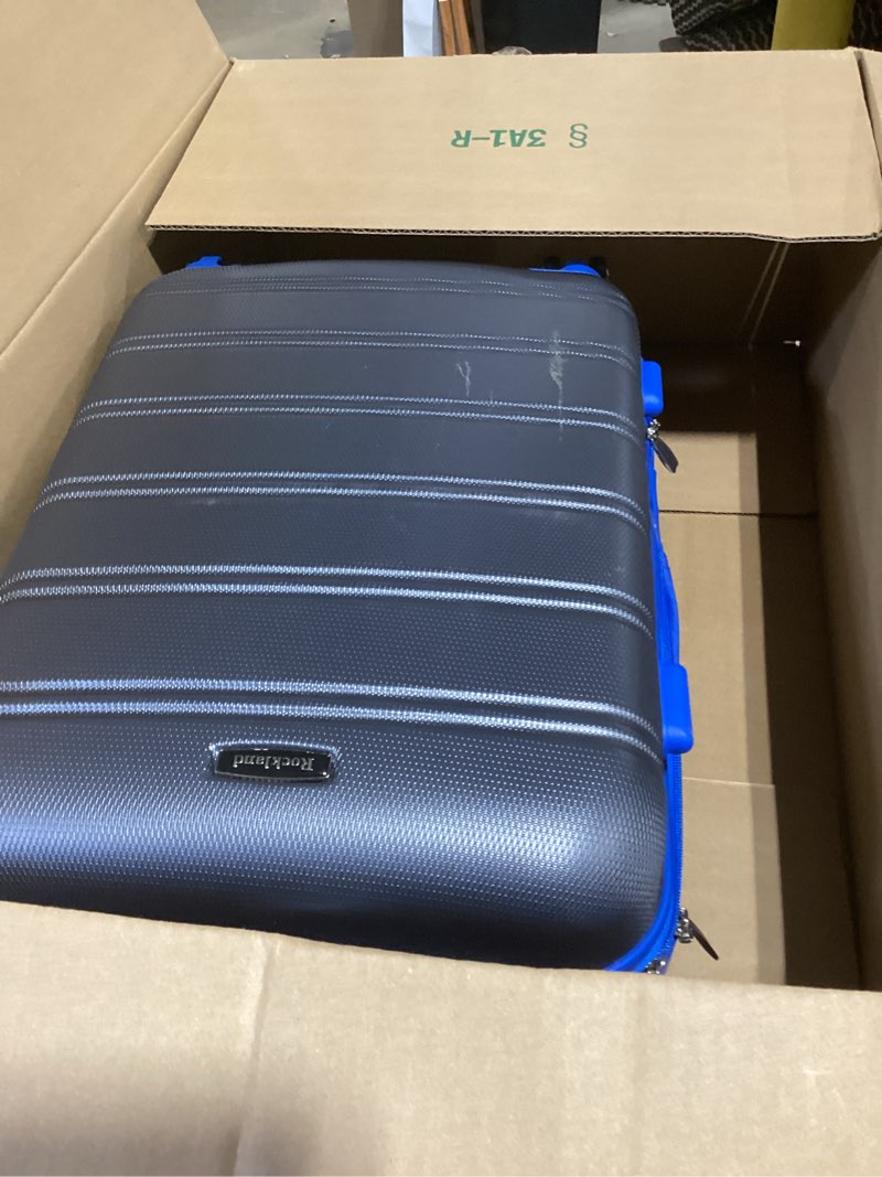 Condition photo showing As Is for rockland melbourne hardside expandable spinner wheel luggage, grey, carry-on 20-inch grey carry-on 20"
