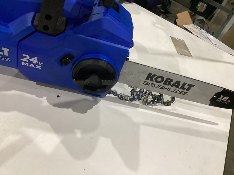 Condition photo showing As Is for kobalt 24-volt 12-in battery 4 ah chainsaw battery included charger included