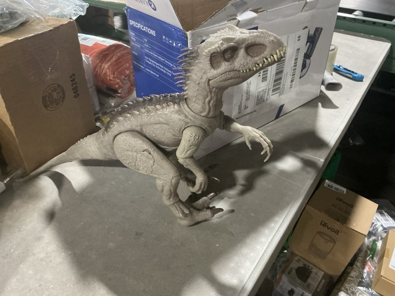Condition photo showing As Is for mattel jurassic world indominus rex dinosaur toy with lights, sounds & motion, camouflage 'n battle i-rex, 21 inches long with digital play