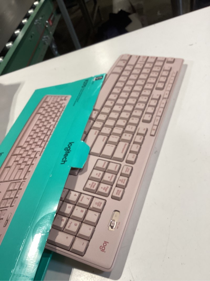 Condition photo showing As Is for logitech k270 wireless keyboard for windows, 2.4 ghz wireless, full-size, number pad, 8 multimedia keys, 2-year battery life, compatible with pc, laptop - rose rose 1 pack keyboard