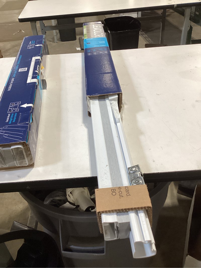 Condition photo showing As Is for levolor 36-in x 72-in snow blackout cordless cellular shade