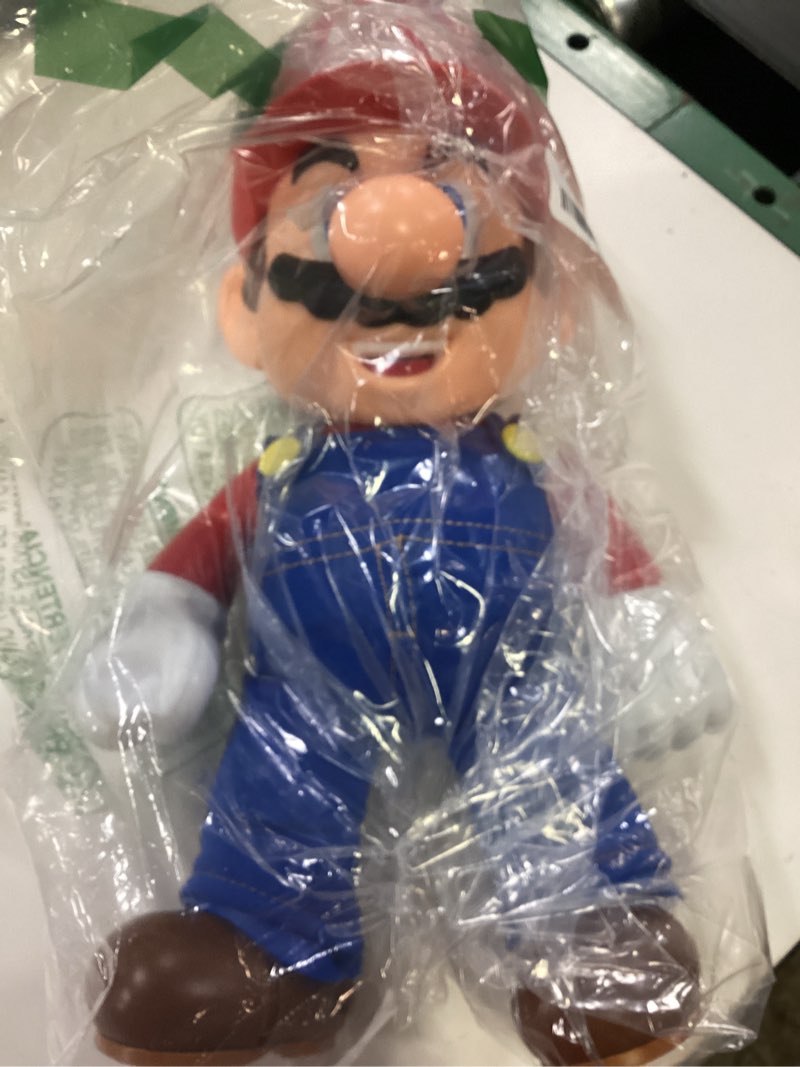 Condition photo showing New/Like New for super mario it's-a me, mario! collectible action figure, talking posable mario figure, 30+ phrases and game sounds – 12 inches tall!