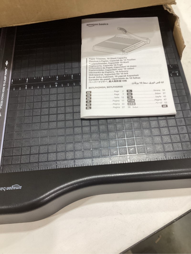 Condition photo showing Good Condition for amazon basics paper trimmer cutter for office and crafts, heavy-duty, portable guillotine paper cutter with blade lock, 12-inch, 10-sheet cardstock, photos