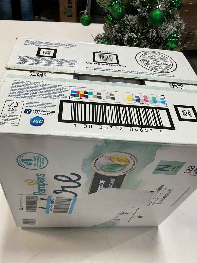 Condition photo showing New/Like New for Pampers Pure Protection Baby Diapers, Size 0 (10 lbs ), 128 Count, Up to 100% Leakproof, Premium Plant-based Skin Protection, Hypoallergenic Soft Diapers Newborn 128