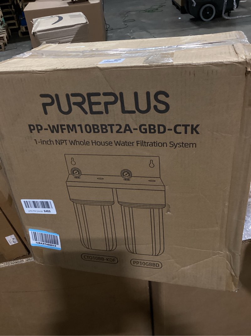 Condition photo showing As Is for pureplus 2-stage whole house water filtration system, reduces chlorine, odor, heavy metals & rust, 10"x4.5" clear housing, 1" inlet/outlet, pp grooved sediment&kdf carbon filters, with pressure gauges sediment & heavy metal reduction