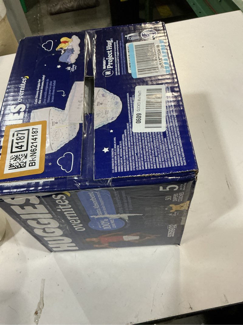 Condition photo showing New/Like New for huggies overnites size 5 overnight diapers (27+ lbs), 50 ct, packaging may vary size 5 50
