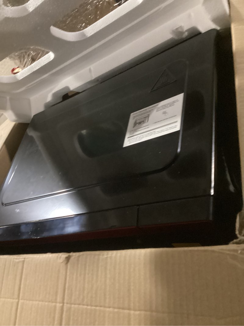 Condition photo showing Good Condition for farberware 1.1 cu. ft. countertop microwave oven – 1000 watts power, auto cook settings, defrost, easy clean and child safety lock - metallic red 1.1 cu. ft. metallic red