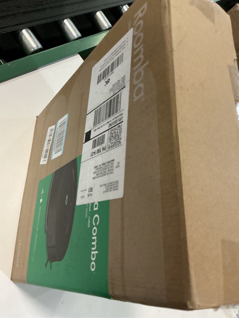 Condition photo showing As Is for iRobot Roomba Robot Vacuum and Mop Combo (Y0140) - Vacuums & mops, Easy to use, Power-Lifting Suction, Multi-Surface Floors, Smart Navigation, Cleans in Neat Rows, Self-Charging, Bagless, Space-Saving Roomba Y0140