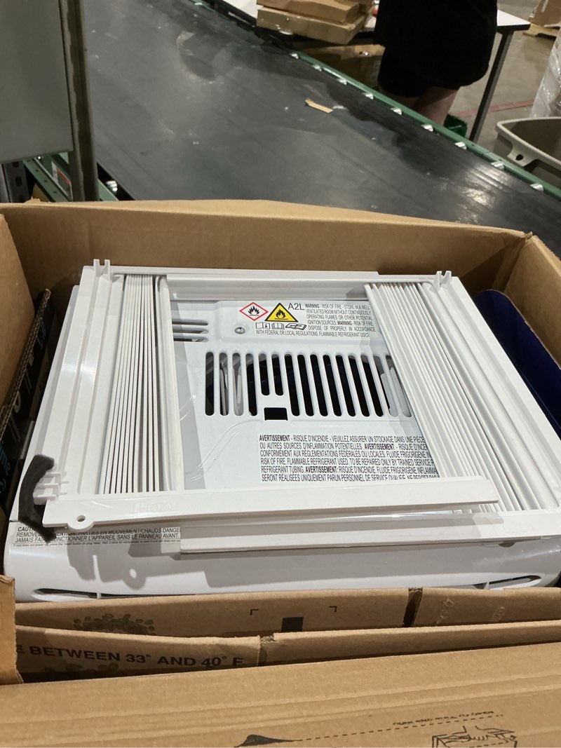 Condition photo showing As Is for (item similar))frigidaire  large room  volt white through-the-wall air conditioner with remote