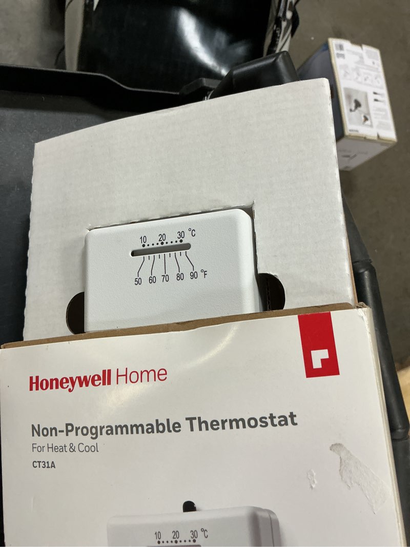 Condition photo showing As Is for honeywell home heating and cooling lever thermostat