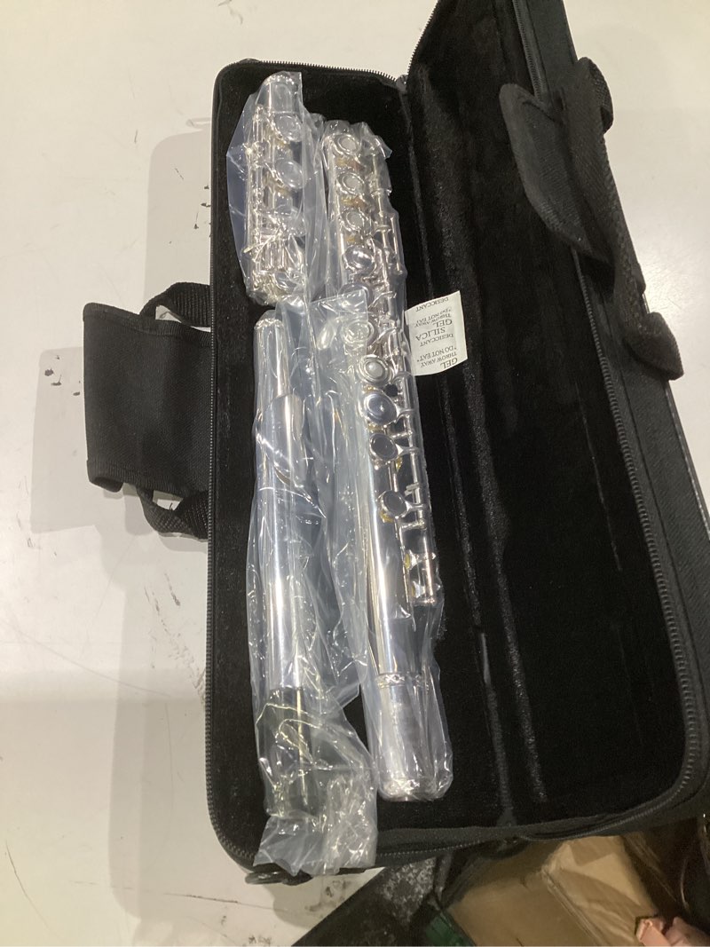 Condition photo showing New/Like New for (incomplete parts)glory silver plated intermediate 17keys, open/closed hole c flute with b foot joint,offset g, with case,cleaning rod, cloth, joint grease, and gloves