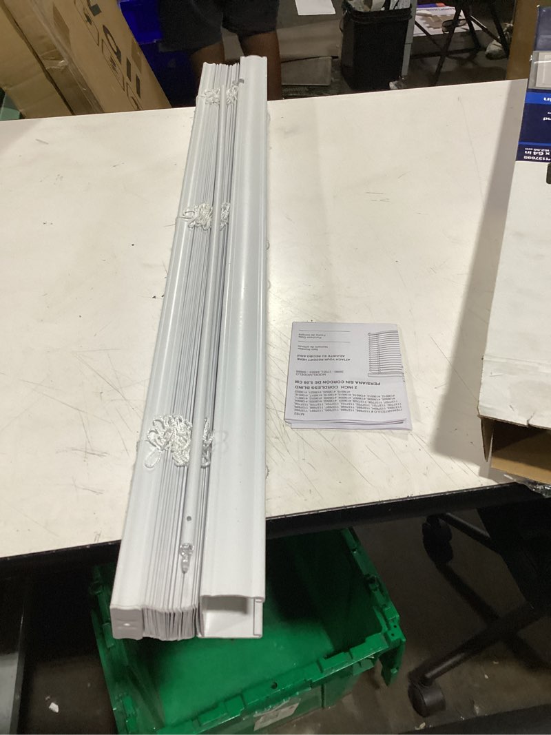 Condition photo showing As Is for project source premium 2-in slat width 35-in x 64-in cordless white vinyl room darkening horizontal blinds