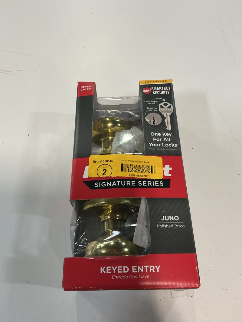 Condition photo showing As Is for kwikset smartkey juno polished brass entry door knob kw1 1-3/4 in.