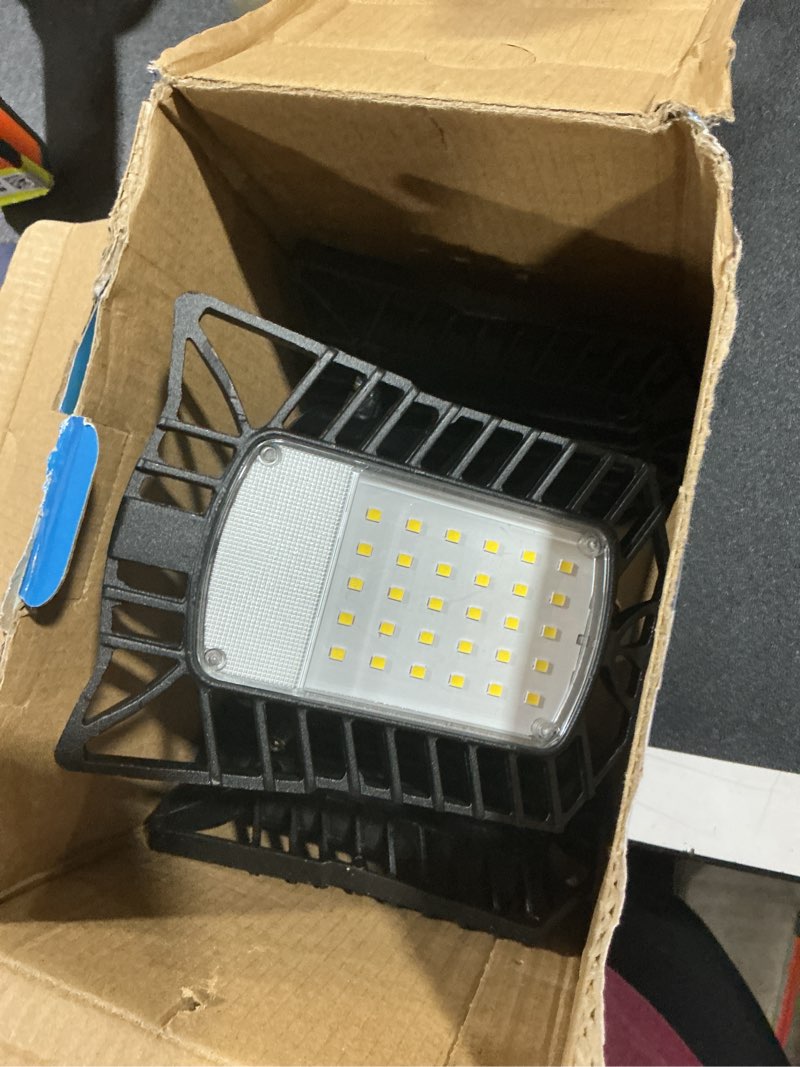 Condition photo showing item condition for Motion Sensor Garage Light, 8000LM LED Garage Lights Motion Activated, 3 Switch Modes, 6500K Indoor Motion Sensor Light Bulb for Garage, Stairway, Laundry Room, Basement (1 Pack)