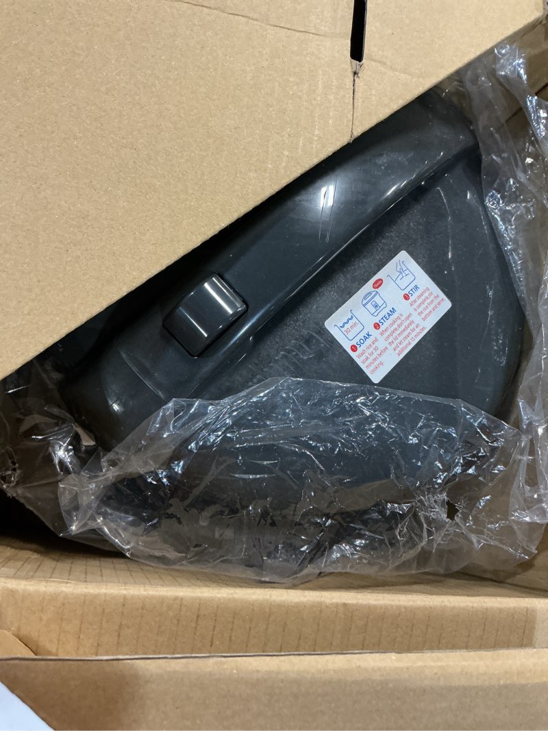 Condition photo showing As Is for Tiger JNP-S15U-KY 8 Cup Capacity White Rice Cooker with Non-Stick Inner Pot, Retractable Power Cord, and Keep Warm up to 12 hours (Obsidian Black)