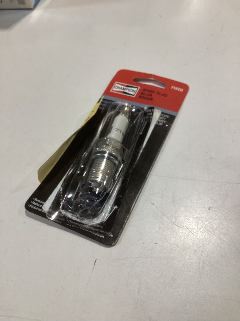 Condition photo showing As Is for champion 5/8-in 4-cycle engine spark plug