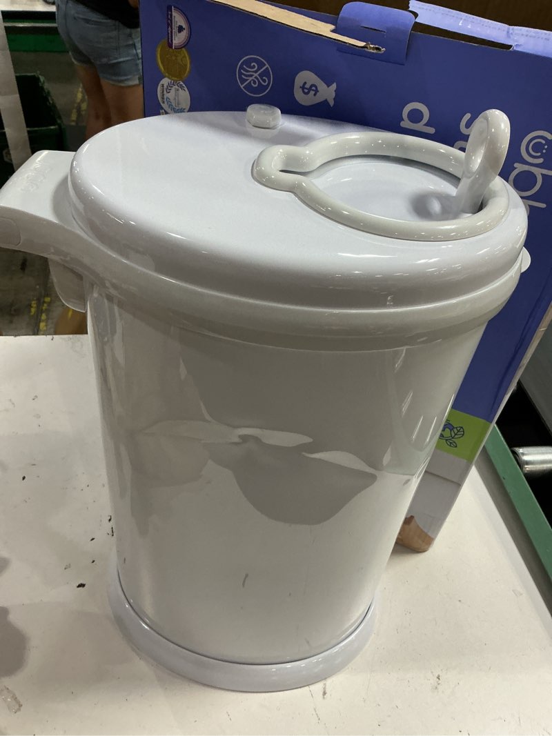 Condition photo showing As Is for ubbi steel diaper pail, odor locking, no special bag required, award-winning, registry must-have, white