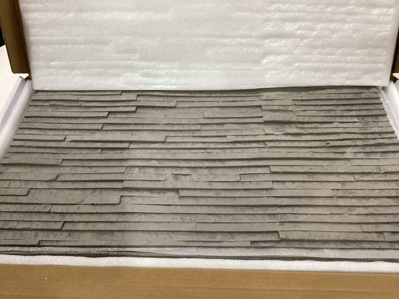 Condition photo showing As Is for **similar too dark grey stone look** 10-sheet beige travertine natural clay mosaic tile, 12\" x 24\" subway flexible stone mcm modified clay material wall tiles for home decoration, indoor & outdoor, covers 19 sq. ft. beige 12\" x 24\" (10 sheets)