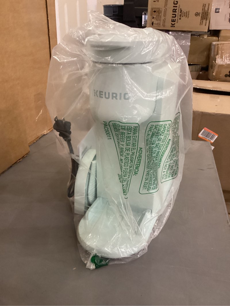 Condition photo showing As Is for Keurig K-Express Single Serve K-Cup Pod Coffee Maker, 3 Brew Sizes, Strong Button Feature, 42oz Removable Reservoir, Mint