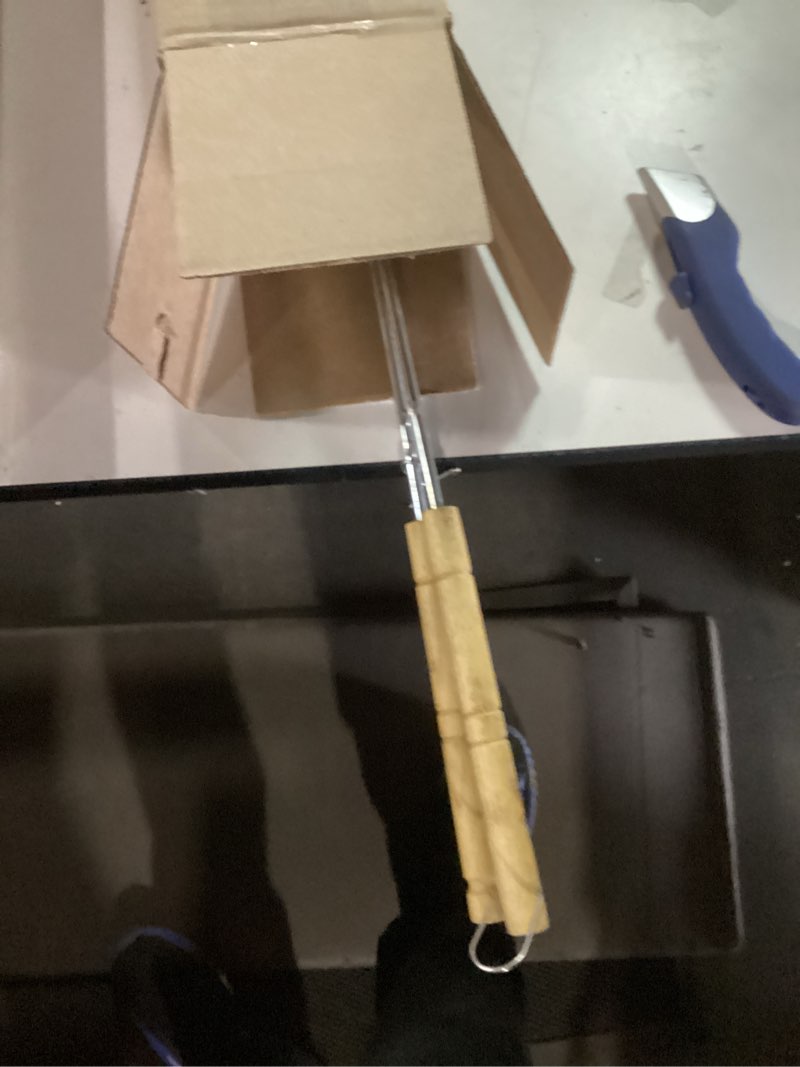 Condition photo showing As Is for Coghlan's Cast Iron Camp Cooker - Pre-Seasoned Pie Iron Sandwich Maker with Heat-Resistant, Removable Handles, Easy-to-Clean for Toasted Pies, Grilled Sandwiches, and Meats, For Campfire Cooking