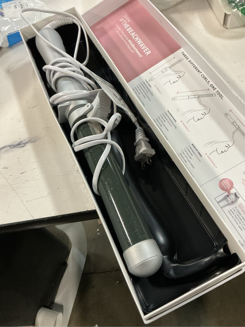 Condition photo showing As Is for the beachwaver co. beachwaver pro 1.25 curling iron new