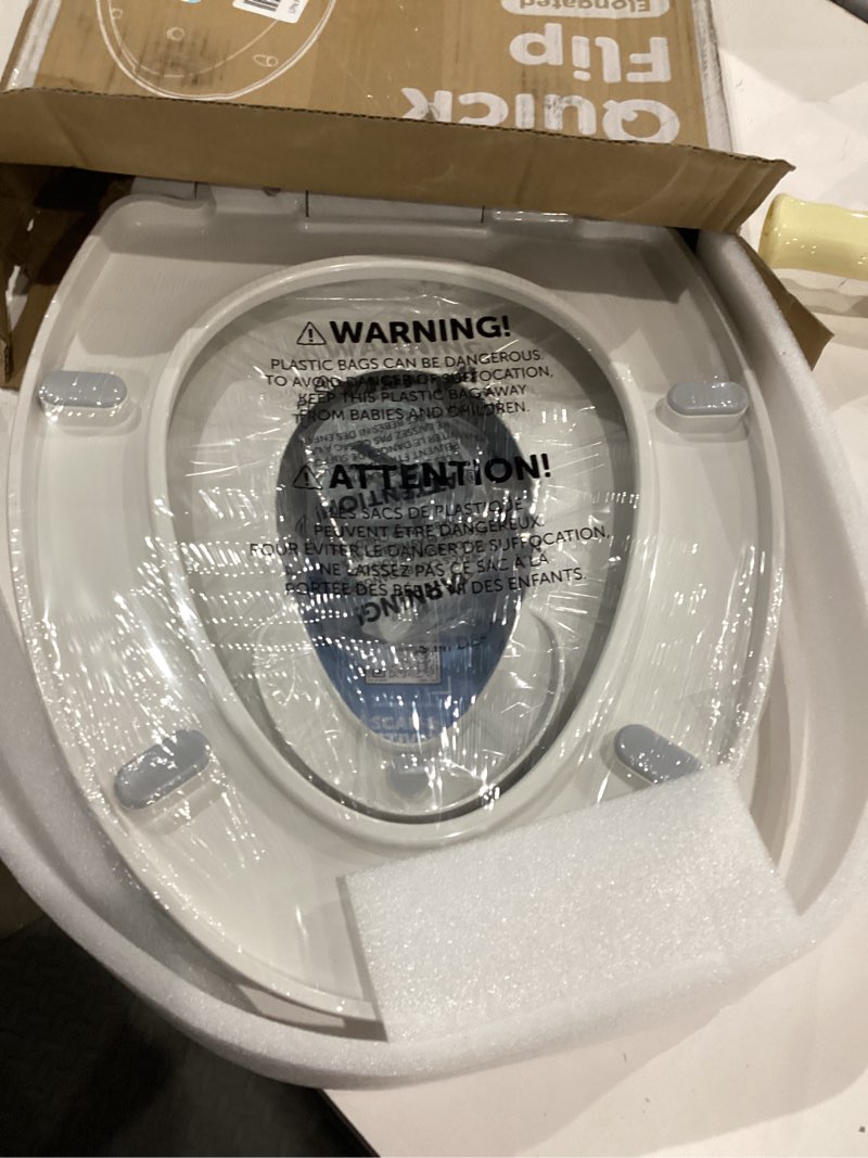 Condition photo showing Good Condition for quick flip toilet seat with built-in potty & splash guard for toddler training, slow close - jool baby (elongated)