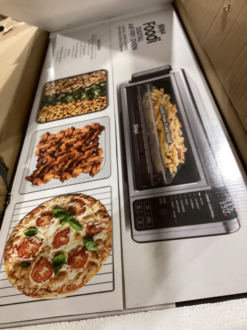 Condition photo showing Good Condition for Ninja Digital Air Fry Countertop Oven, 8-in-1 Functionality, 1800W, Flip-Up Design, XL Capacity, Air Fry Basket, Wire Rack & Crumb Tray, Silver, SP101 8-in-1 Flip Oven
