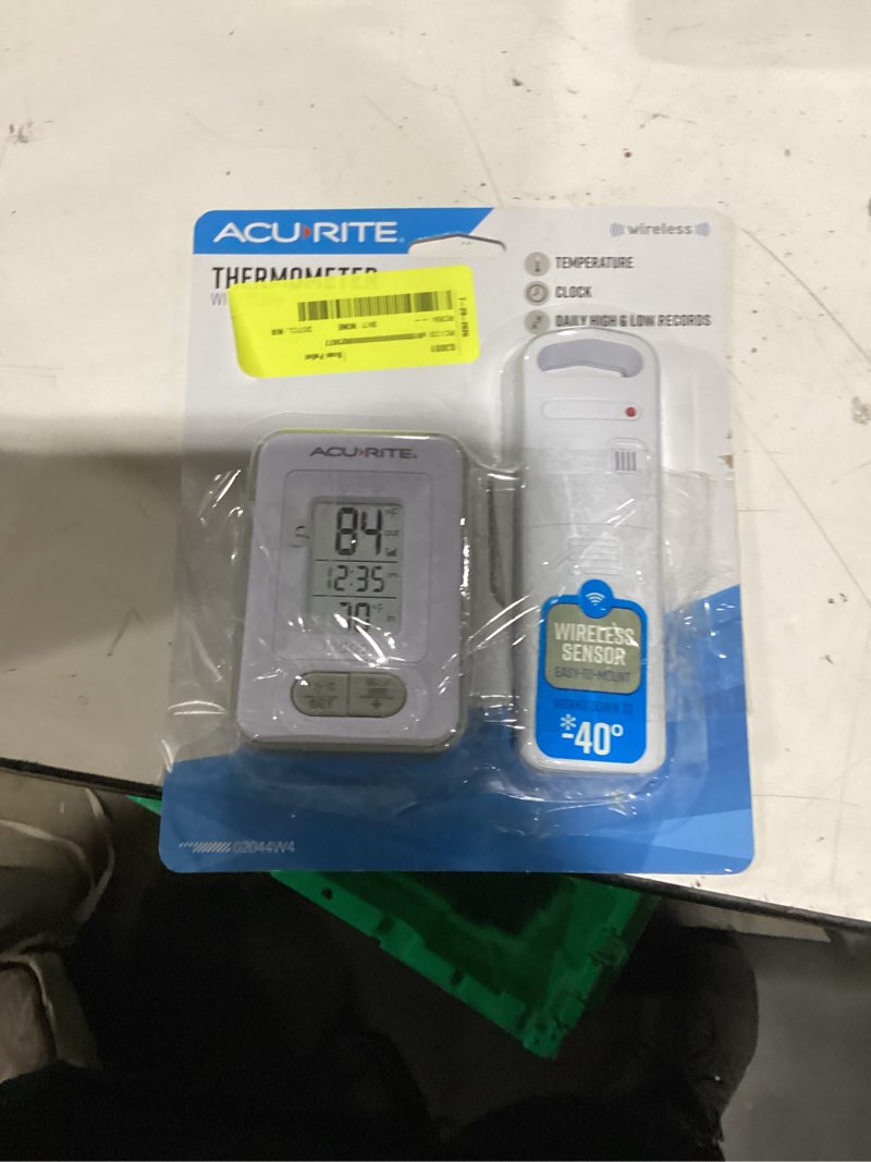 Condition photo showing New/Like New for acurite battery-powered indoor/outdoor digital thermometer with clock, white, 3.5" h x 2.3" w x 1.2" d