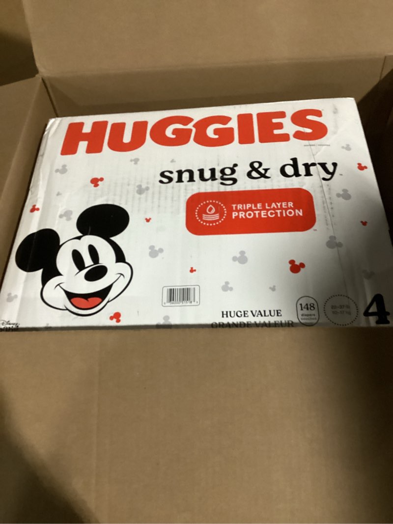 Condition photo showing As Is for Huggies Size 4 Diapers, Snug & Dry Baby Diapers, Size 4 (22-37 lbs), 148 Count, Packaging May Vary