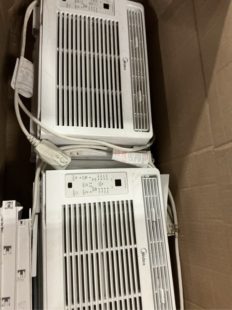 Condition photo showing As Is for midea 5,000 btu window air conditioner with remote control and timer, cools up to 150 sq ft