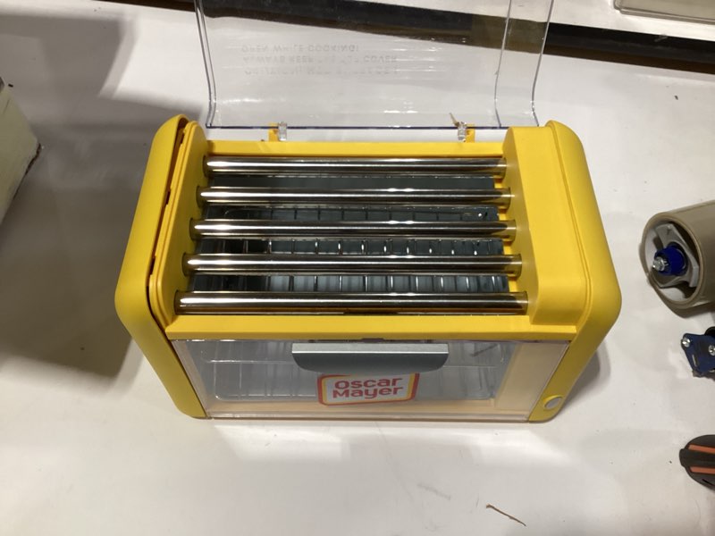 Condition photo showing As Is for Nostalgia Oscar Mayer Extra Large Countertop 8 Hot Dog Roller and Bun Toaster Oven - Stainless Steel Rollers and Non-stick Warming Racks - Adjustable Timer Hot Dog Roller Yellow