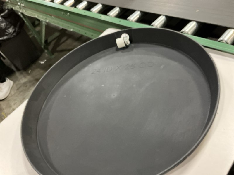 Condition photo showing As Is for Everflow PWHP24 Plastic Water Heater Drain Pan with 1 in. - 1-1/2 in. PVC Fitting, 24 in. Diameter Black