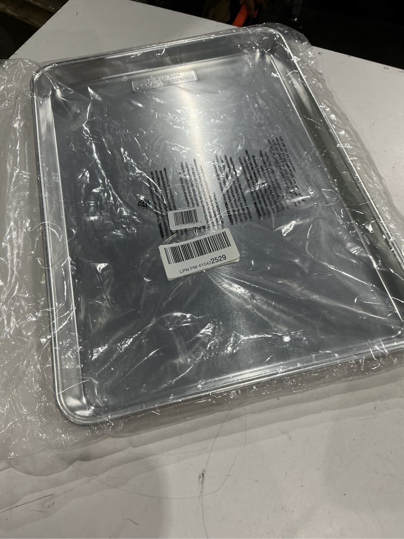 Condition photo showing New/Like New for nordic ware naturals half sheet set - usa made aluminum commercial quality sheet pan for baking or roasting, encapsulated galvanized steel rim prevents warping, 2pk half + lid