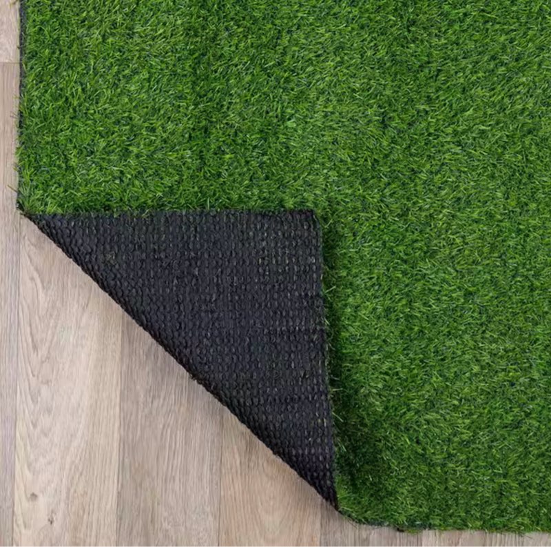 Condition photo showing New/Like New for indoor/outdoor artificial grass area rug, dense synthetic turf patio, deck and high-traffic areas 3 ft. x 12 ft. green