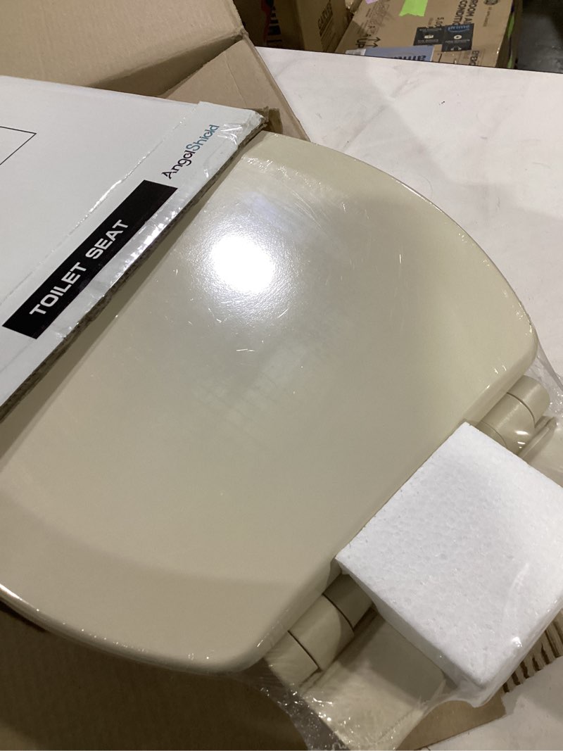Condition photo showing New/Like New for angol shiold quiet-close molded wood toilet seat with non-slip adjustable hinges, anti-pinch bumpers, easy install & clean?biscuit, elongated 18.5''? elongated 18.5‘’ biscuit