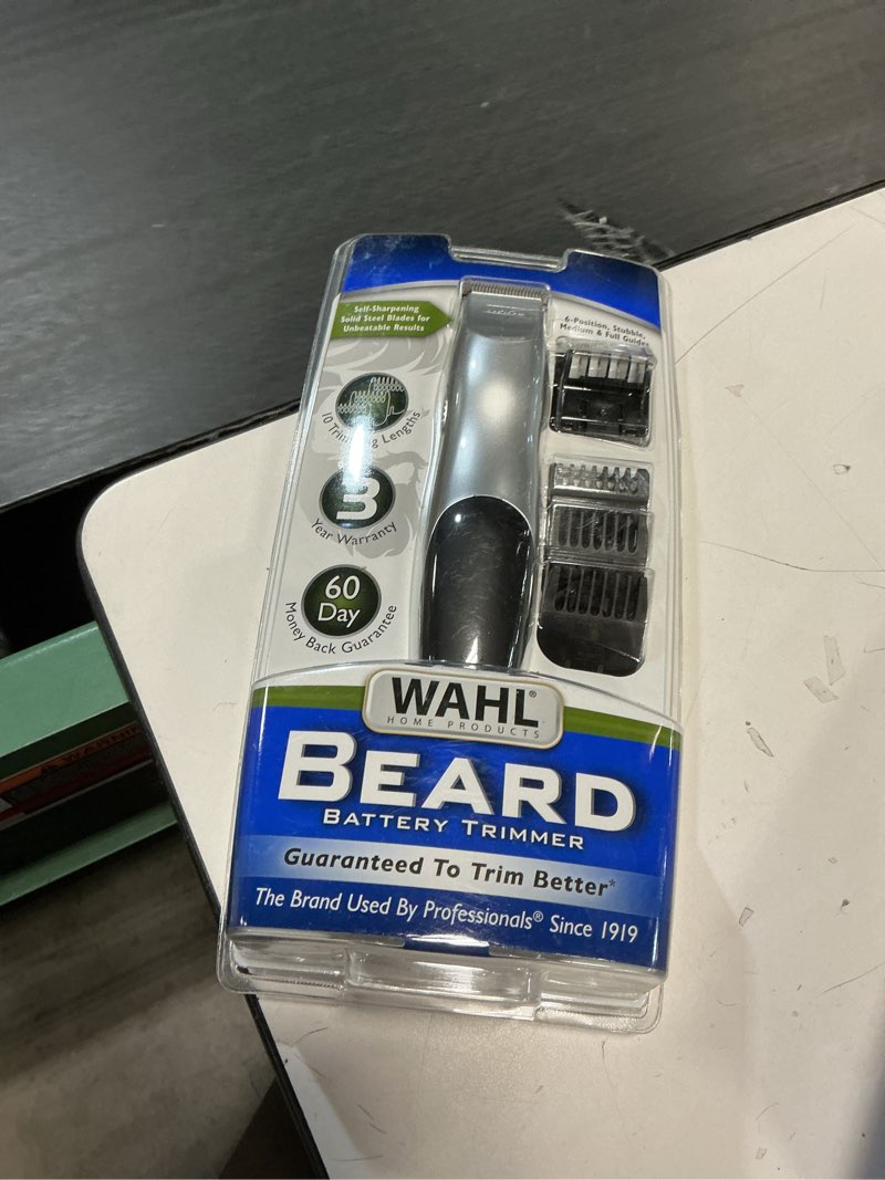 Condition photo showing New/Like New for wahl groomsman battery operated facial hair trimmer for beard & mustache trimming including light detailing and body grooming – model 9906-717v