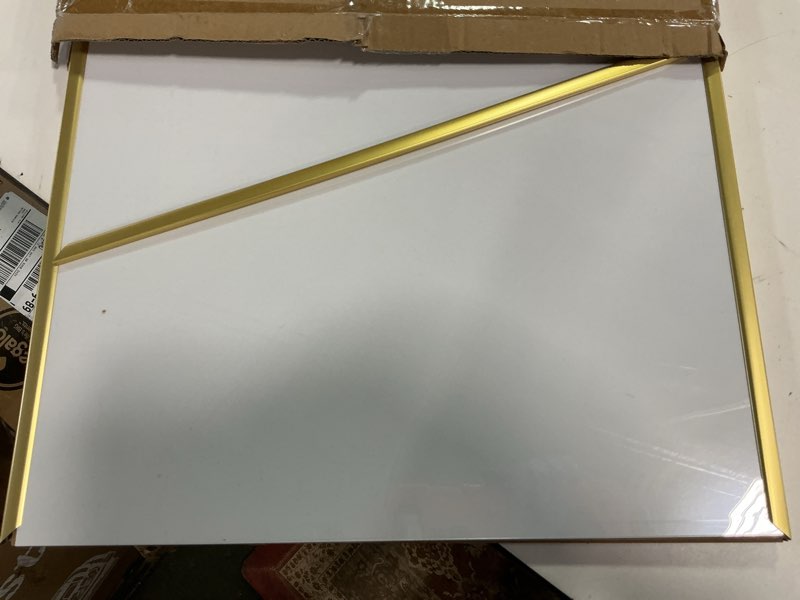 Condition photo showing As Is for upsimples 18x24 Picture Frame Gold 3 Pack, Scratch-Proof Poster Frames 18 x 24 for Photo Gallery - Slide-In Strips, Horizontal or Vertical Wall Mounting Gold 18x24