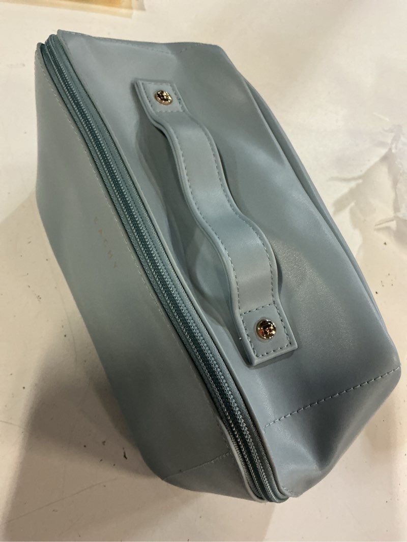 Condition photo showing New/Like New for eachy travel makeup bag, large capacity cosmetic bag for women, waterproof pu leather, flat open portable toiletry bag for skincare, brushes & travel essentials medium aj-blue